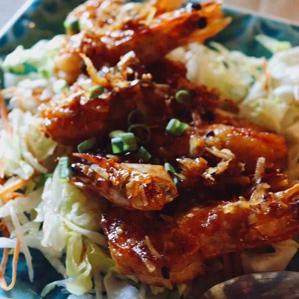 Sweet and sour prawns with green onions and shredded cabbage from Shiok Singapore Kitchen.